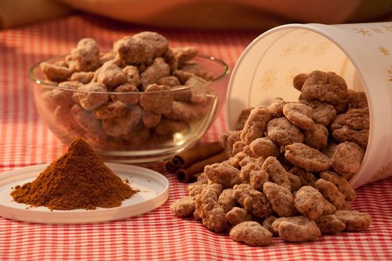 cinnamon pecans spilling out of container