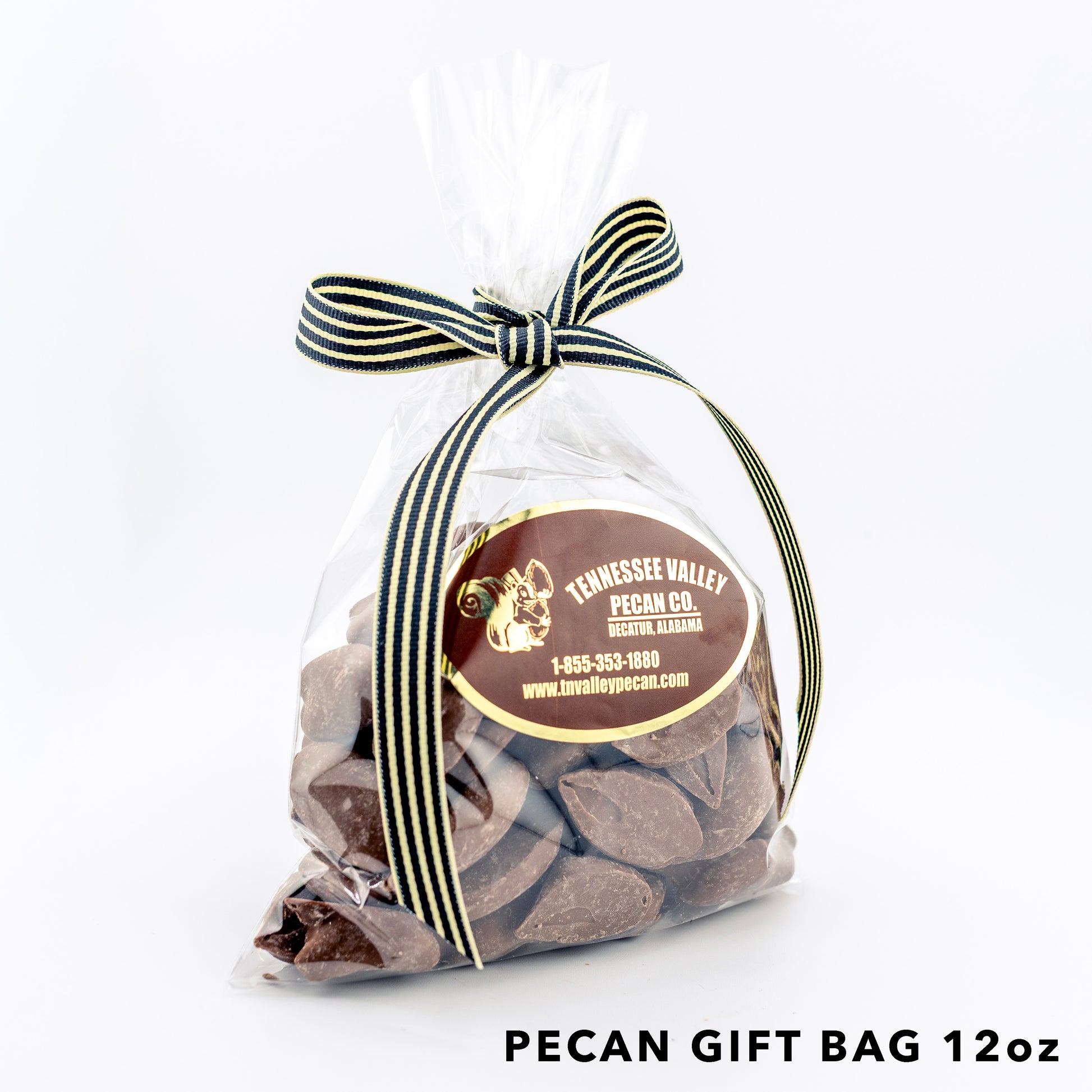 Pecan gift bag with a ribbon and Tennessee Valley Pecan Co. label on a white background