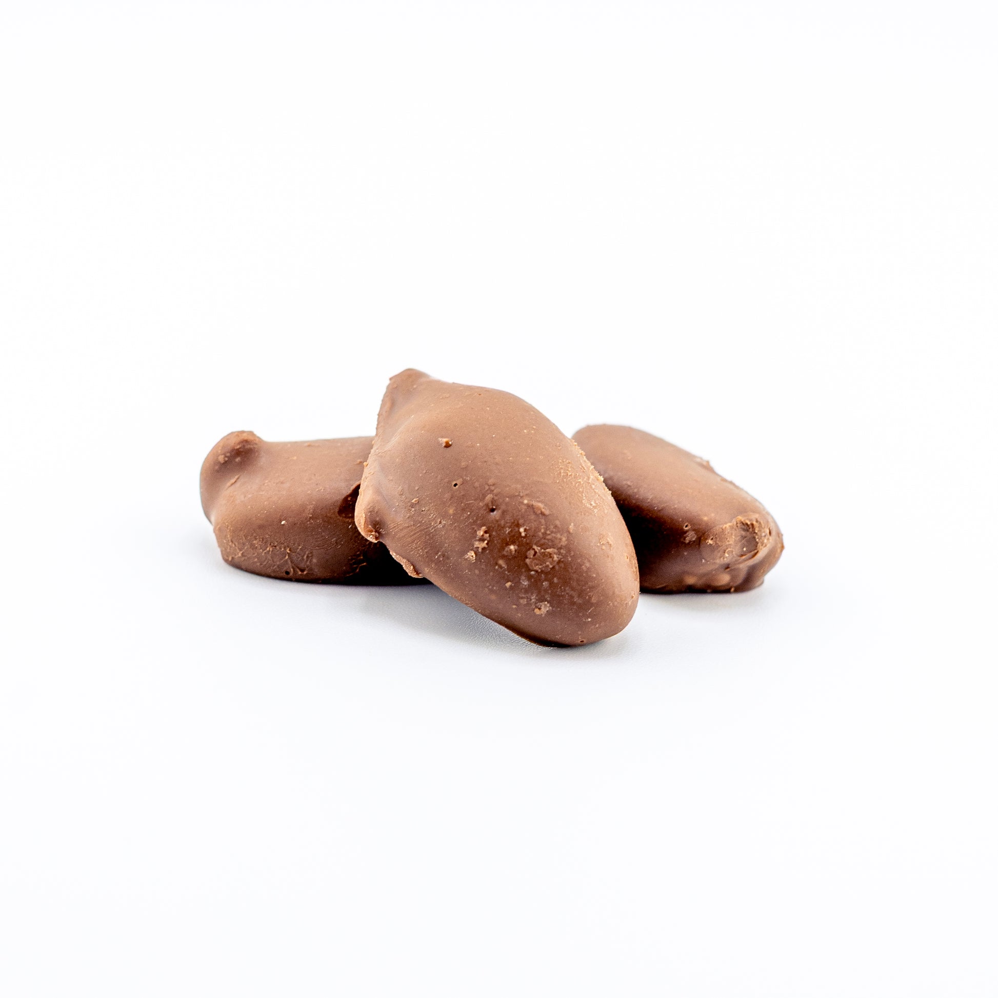 Premium Milk Chocolate Pecans on a white background