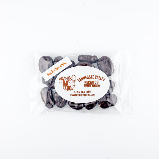 Pack of dark chocolate pecans with Tennessee Valley Pecan Co. branding on a white background