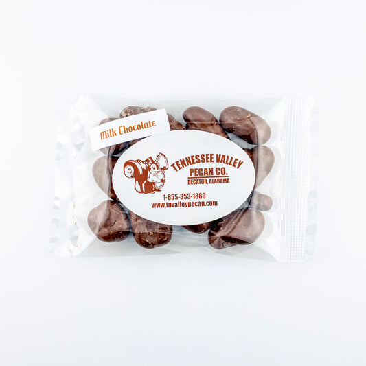 Packaged milk chocolate pecans with Tennessee Valley Pecan Co. label on a white background