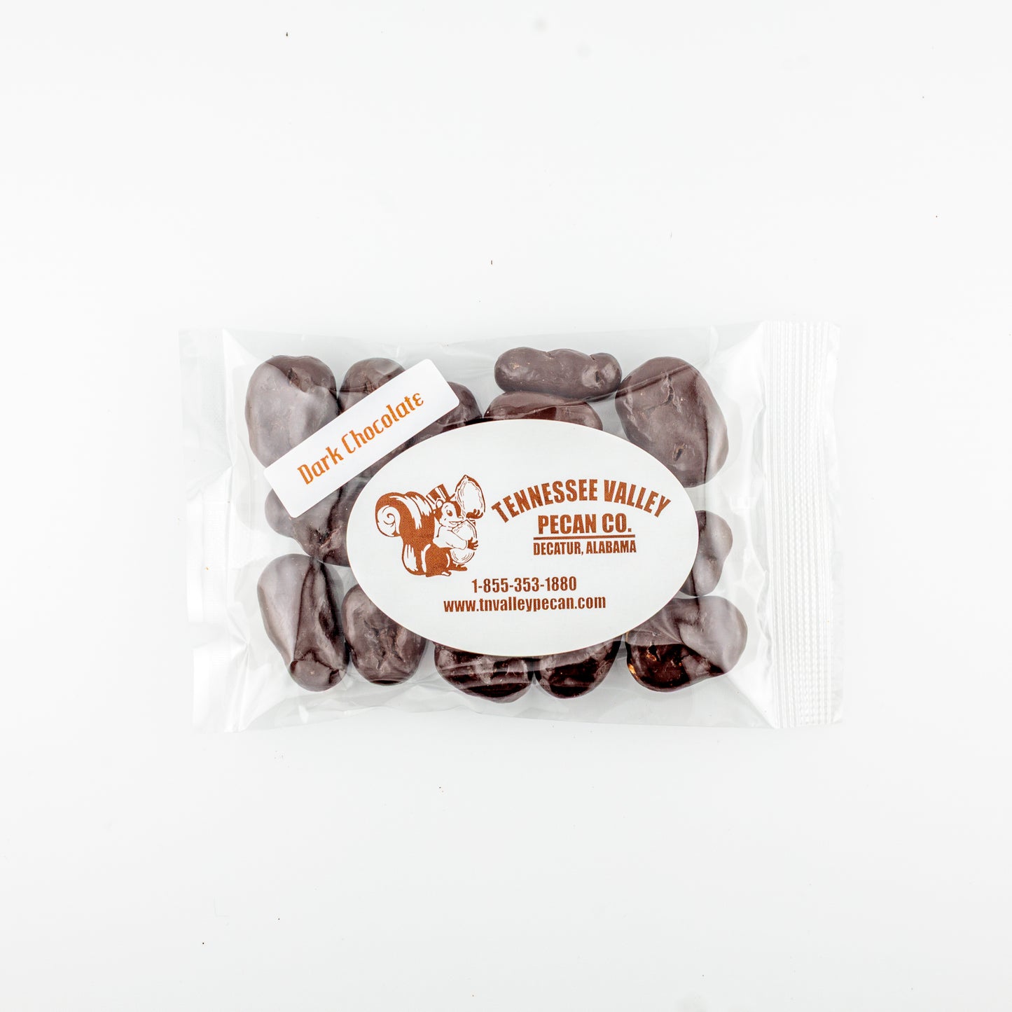 Pack of dark chocolate-covered pecans with Tennessee Valley Pecan Co. branding on a white background