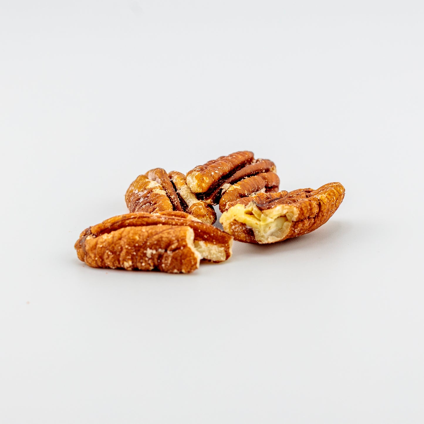 Toasted Pecans on a white background