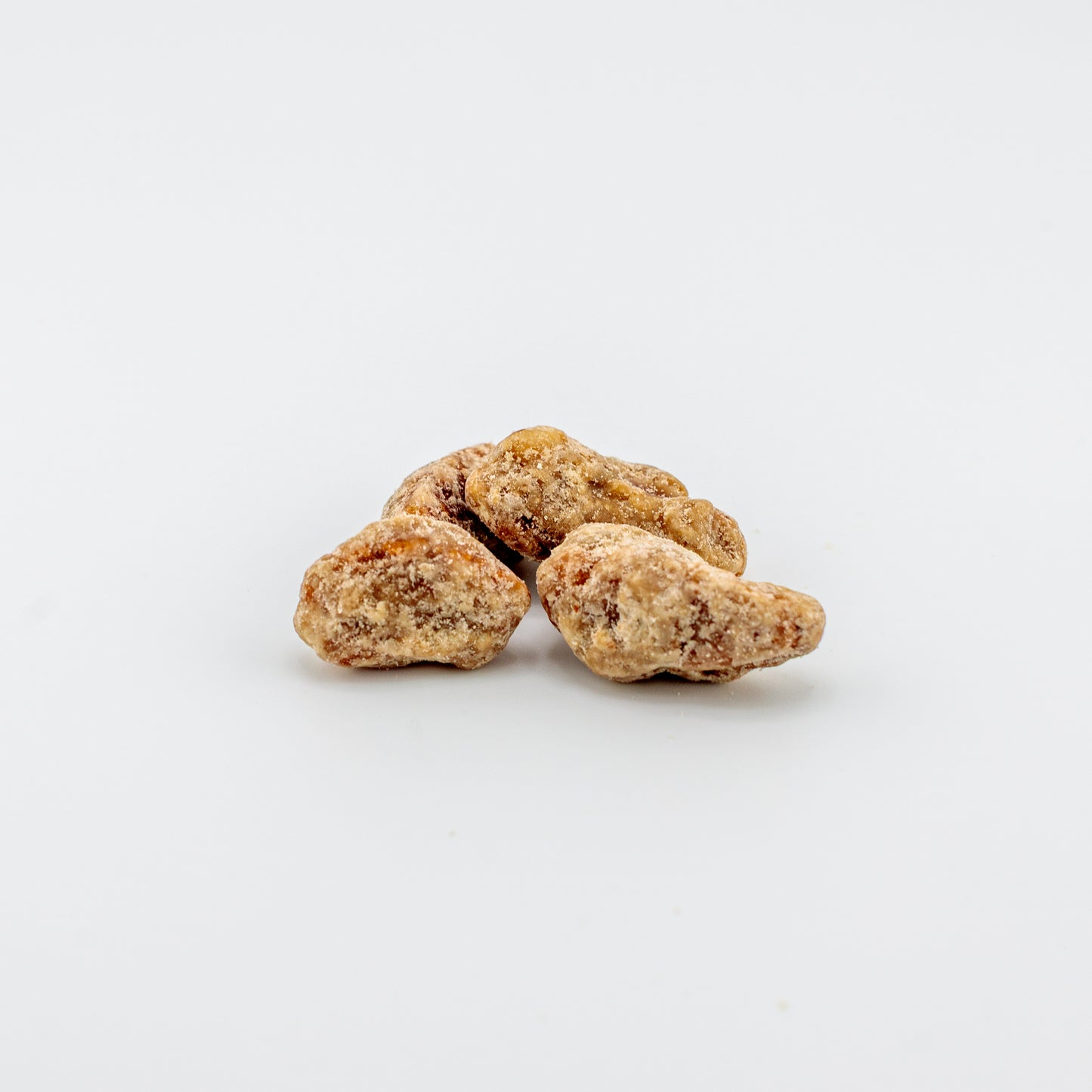 Praline Pecans on a white background