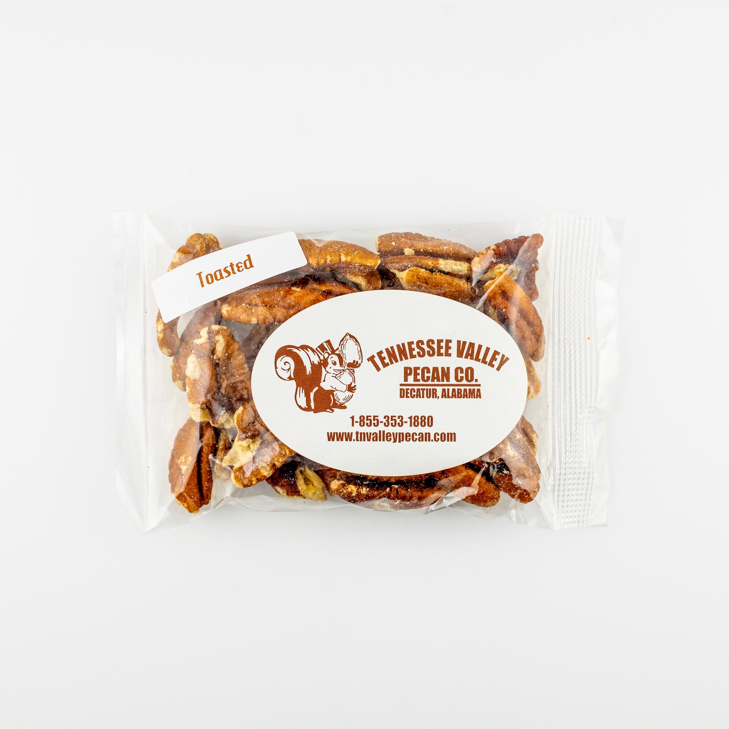 Packaged toasted pecans with Tennessee Valley Pecan Co. branding on a white background