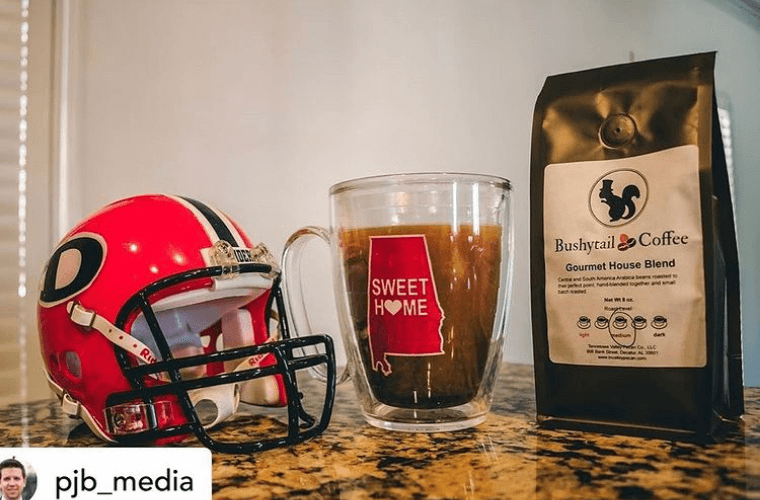 coffee bag with coffee mug and small football helmet on counter