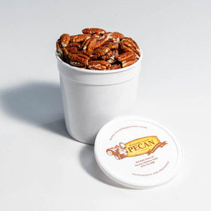 toasted pecans in a quarter gallon white tub