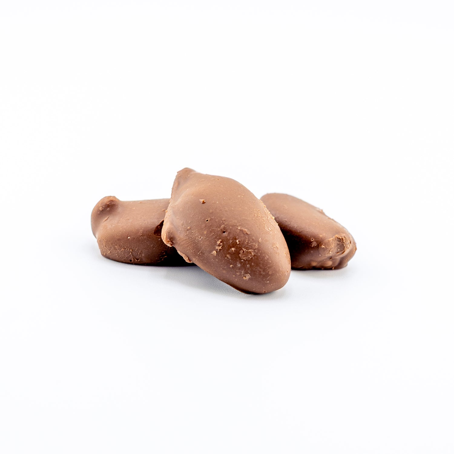 Premium Milk Chocolate Pecans on a white background 