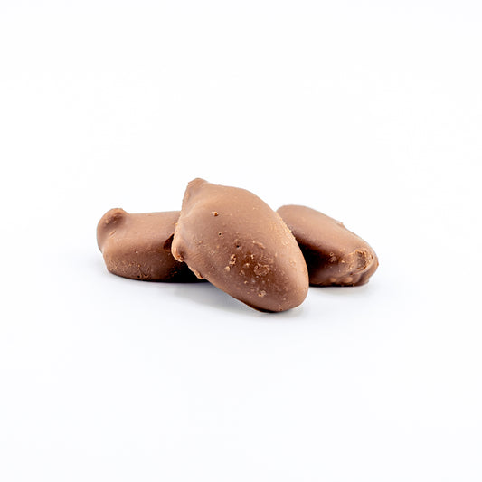 Premium Milk Chocolate Pecans on a white background 