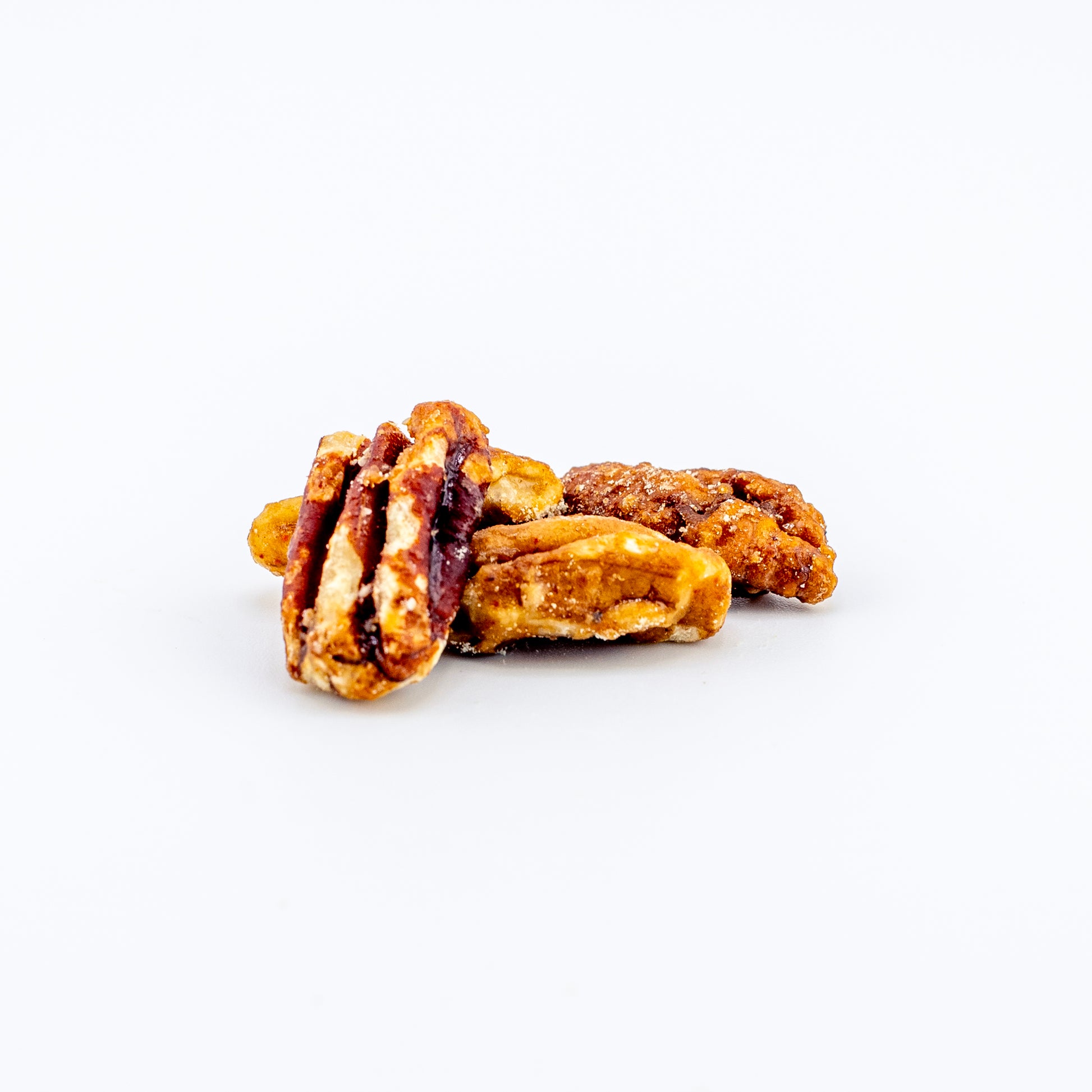 Sweet Heat pecans on a white background