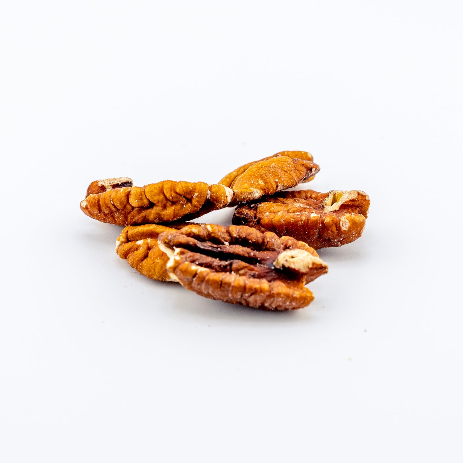 Mammoth Pecan Halves on a white background