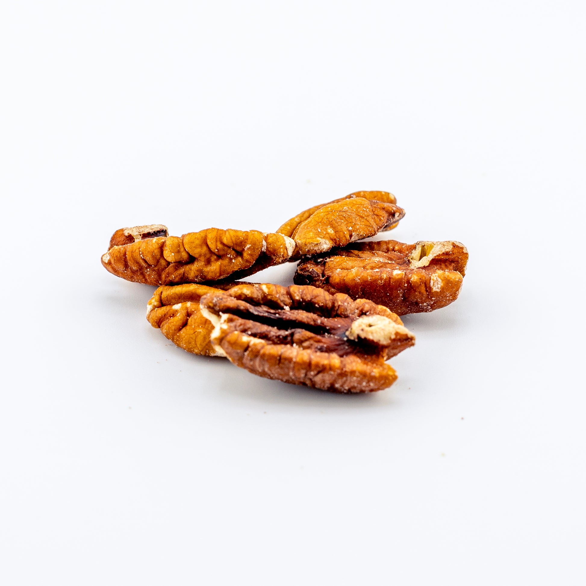 Mammoth Pecan Halves on a white background