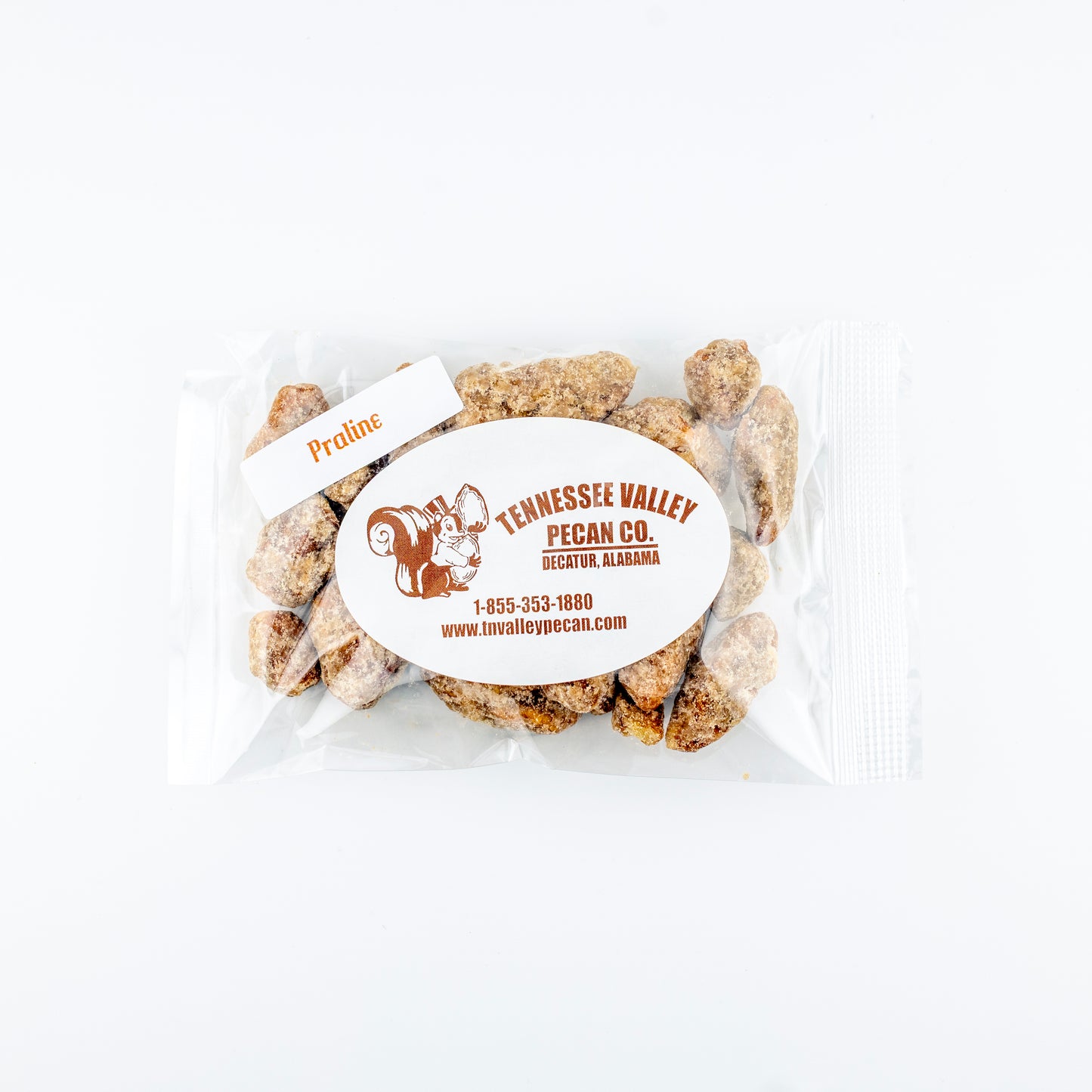 Packaged snack pack of Praline Pecans with Tennessee Valley Pecan Co. label on a white background