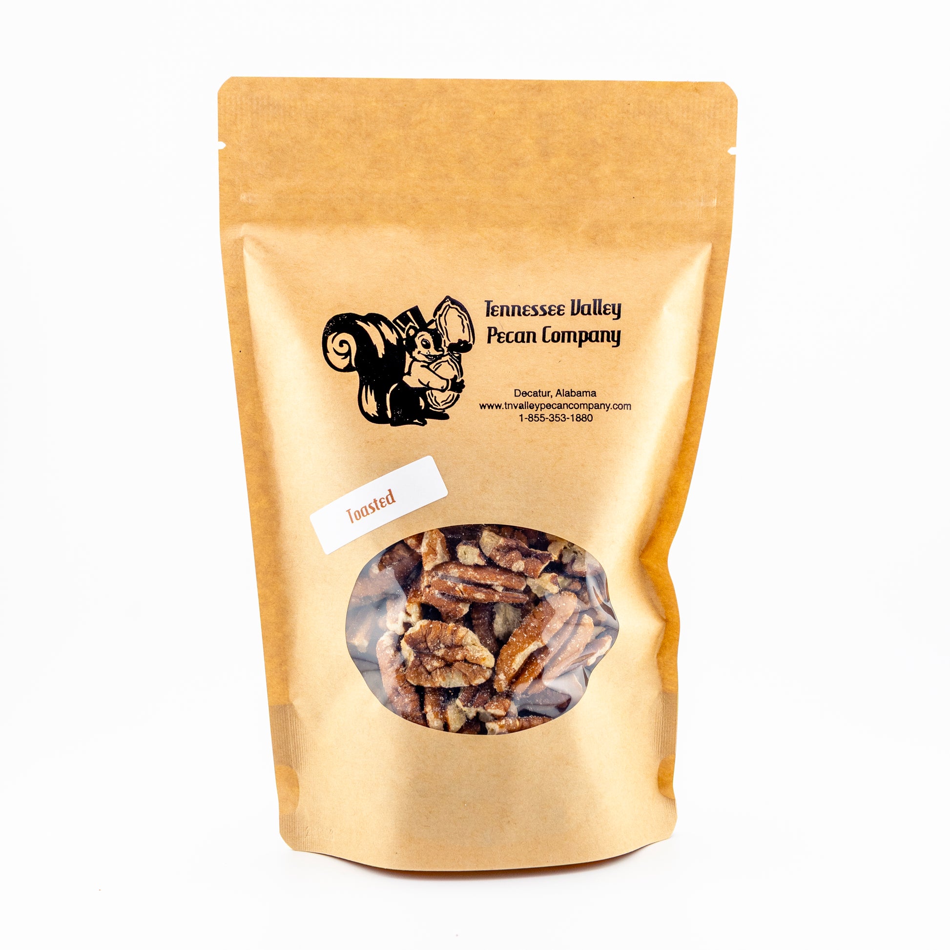 Kraft paper bag of Toasted Pecans with Tennessee Valley Pecan Company branding and a window displaying pecans.