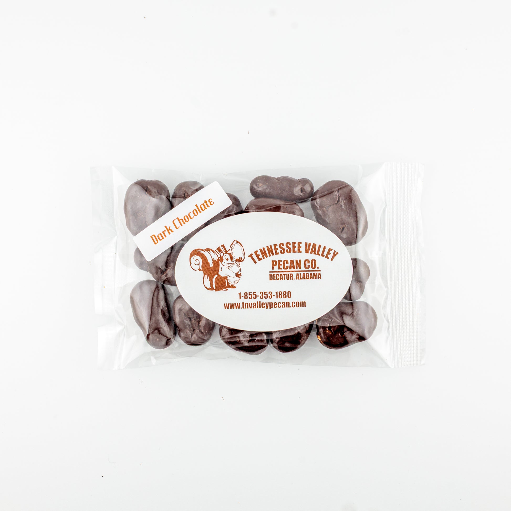 Pack of dark chocolate-covered pecans with Tennessee Valley Pecan Co. branding on a white background