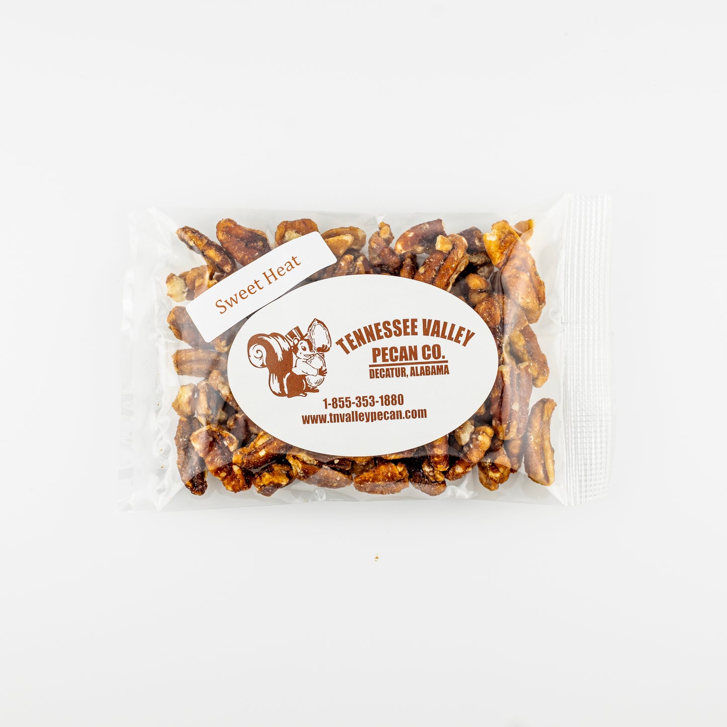 Packaged snack pack of Sweet Heat Pecans with Tennessee Valley Pecan Co. label on a white background