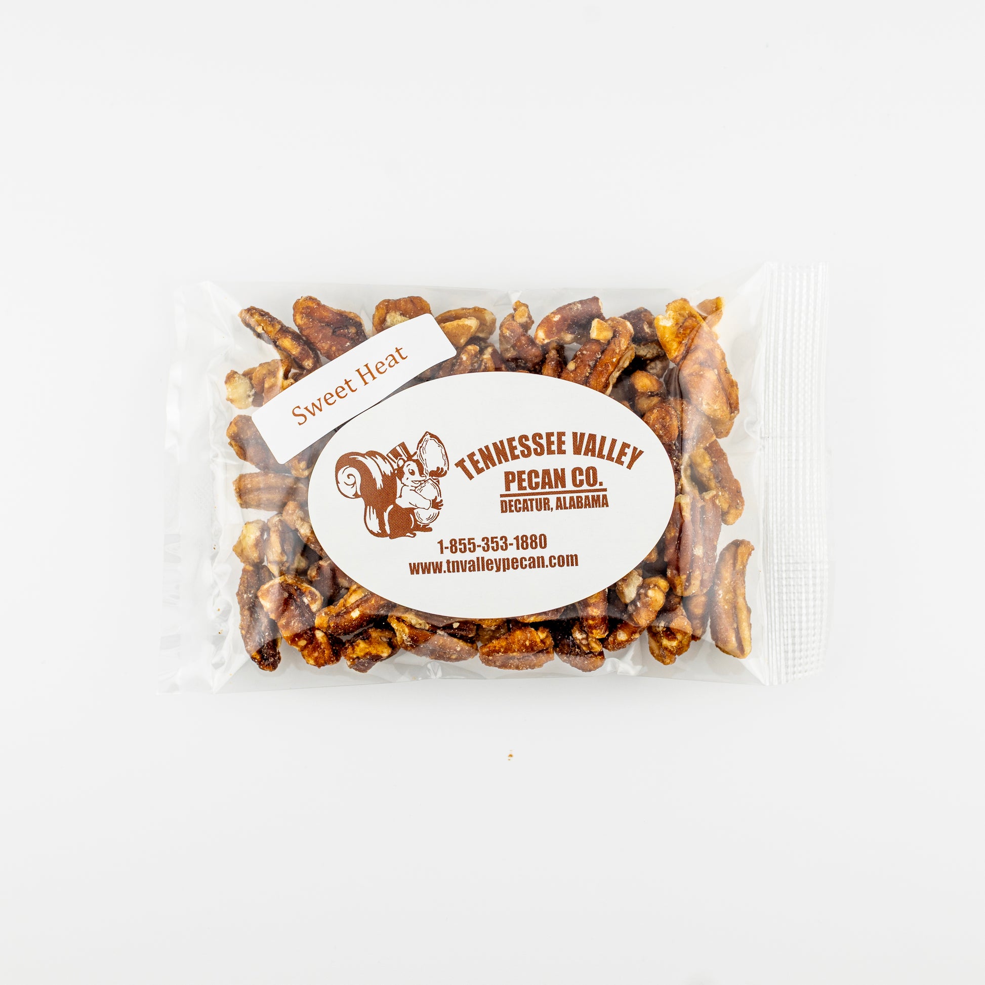 Packaged snack pack of Sweet Heat Pecans with Tennessee Valley Pecan Co. label on a white background