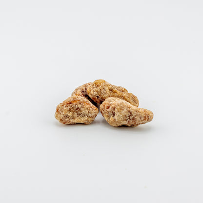 Praline Pecans on a white background