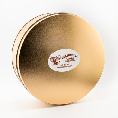 Gold round tin with a label on a white background