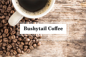 Overhead image of coffee in mug and coffee beans on table with text 