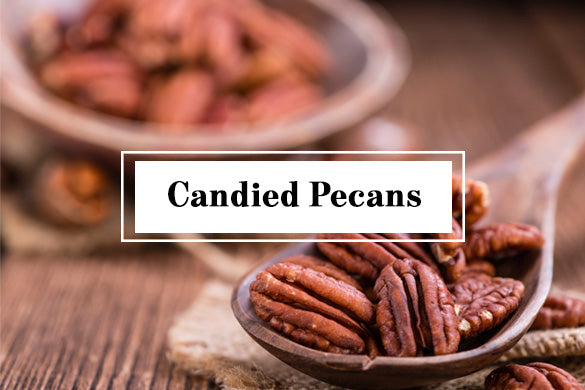 Pecans resting on spoon with text "Candied Pecans"