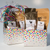 Confetti Gift Basket Box filled with gourmet pecans and Bushytail Coffee